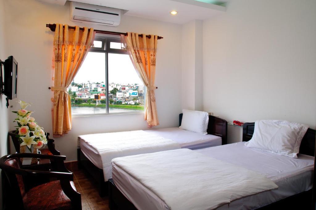 Minh Quan Hotell Bảo Lộc Rom bilde