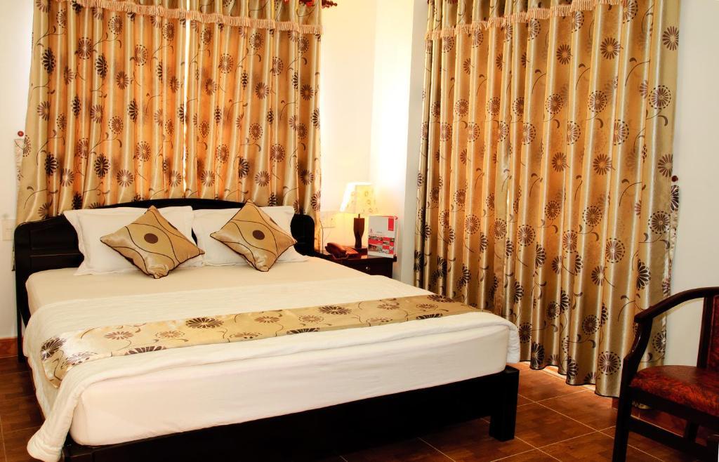 Minh Quan Hotell Bảo Lộc Rom bilde