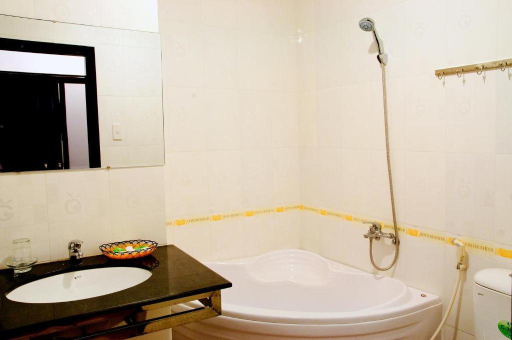 Minh Quan Hotell Bảo Lộc Rom bilde