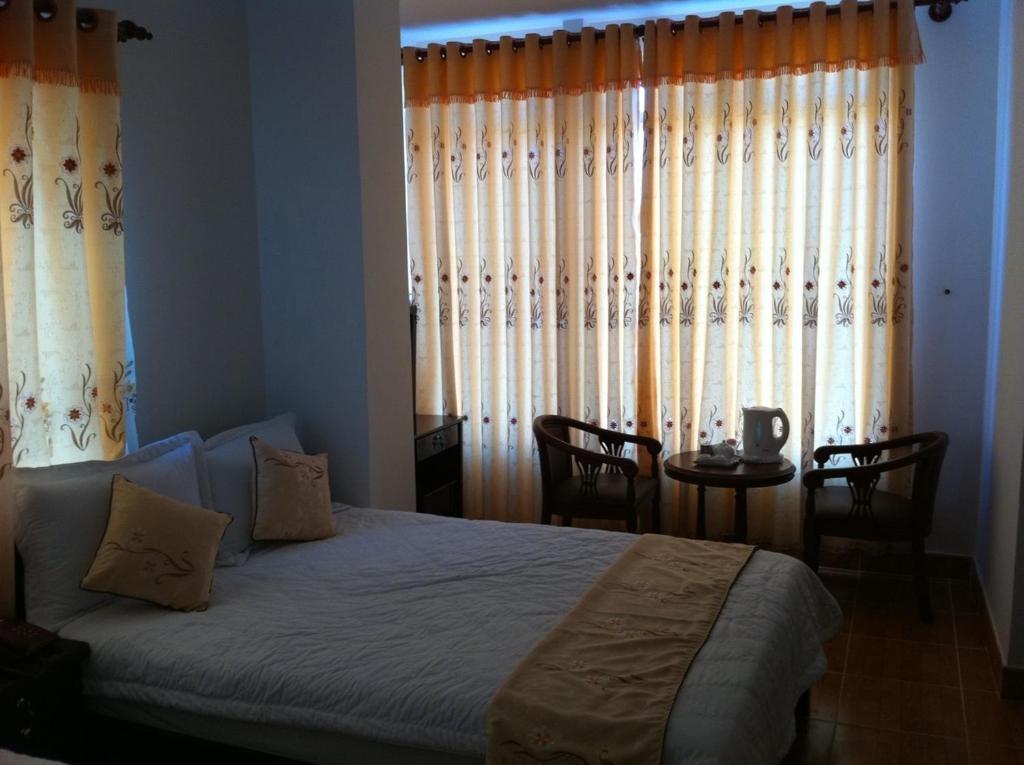 Minh Quan Hotell Bảo Lộc Rom bilde